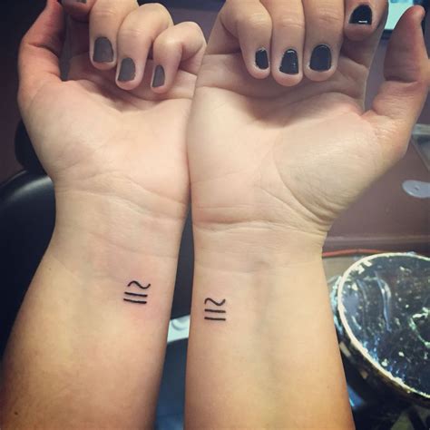 Twin tattoo, the mathematical symbol for congruence- meaning the same but different, sister ...