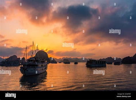 Amazing sunset over Ha Long Bay, Vietnam Stock Photo - Alamy