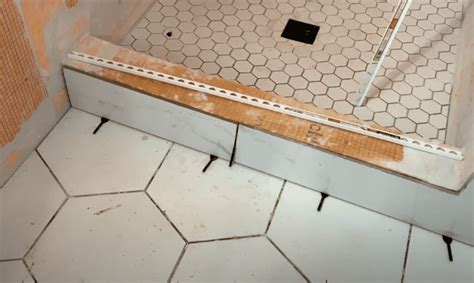 How to Tile a Shower Curb (Schluter Kerdi Shower Curb Tile Installation) - AT Improvements