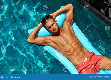 Summer Man Body Care. Beautiful Male Relaxing in Pool Stock Image - Image of summer, fashion ...