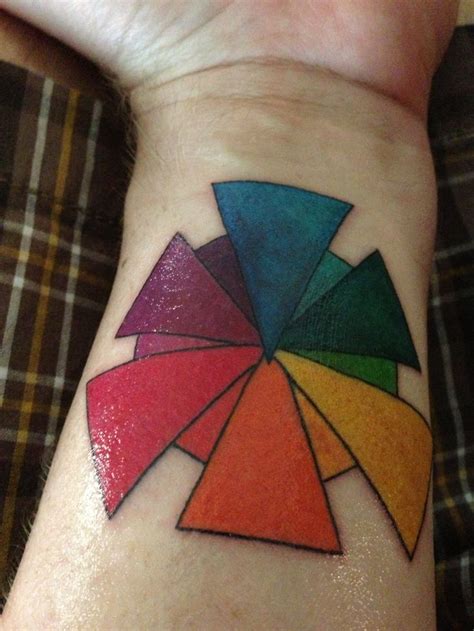 Pin by IsleofYou Salon on tattoo ideas | Color wheel tattoo, Single rose tattoos, Rainbow tattoos