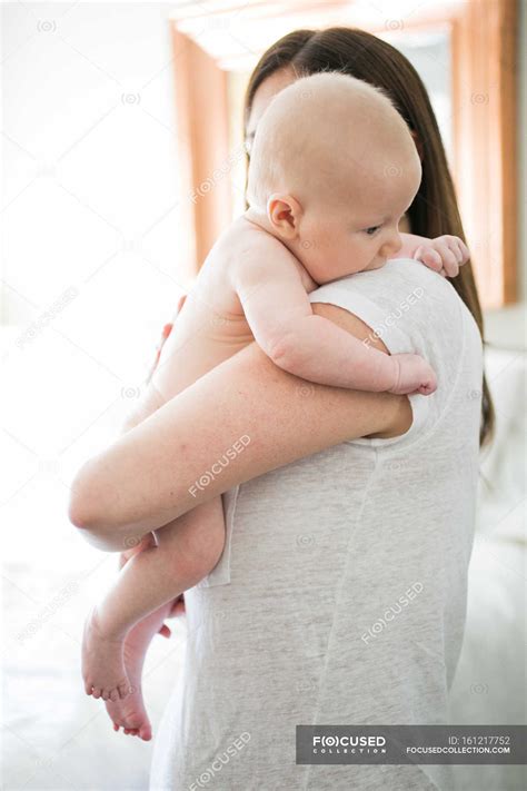 Mother hugging baby boy — female, Family With One Child - Stock Photo ...