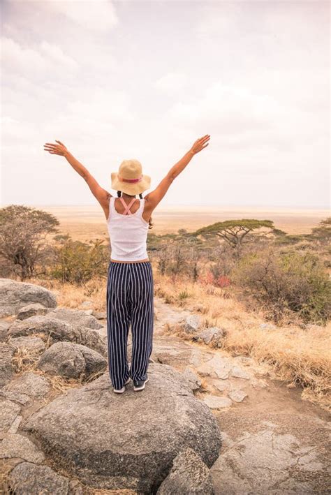 Girl at View Point Looking To the Bush Savannah of Serengeti at Sunset ...