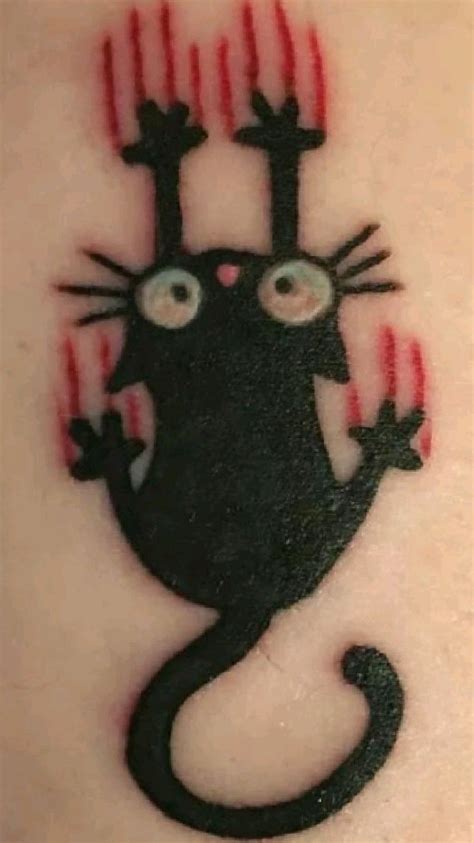 Black Cat Tattoo with Red Claws | Tiny and Cool Tattoo Inspiration