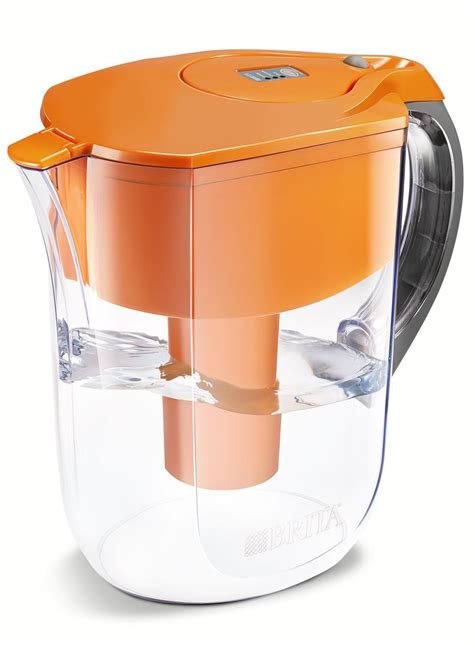 an orange and clear water pitcher is shown on a white background with the lid open