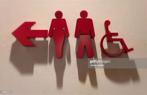 Public Bathroom Sign High-Res Stock Photo - Getty Images