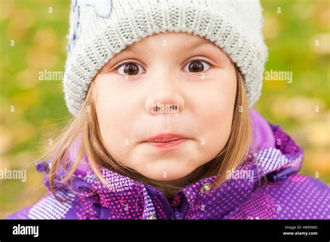 Cute little girl in purple hi-res stock photography and images - Alamy
