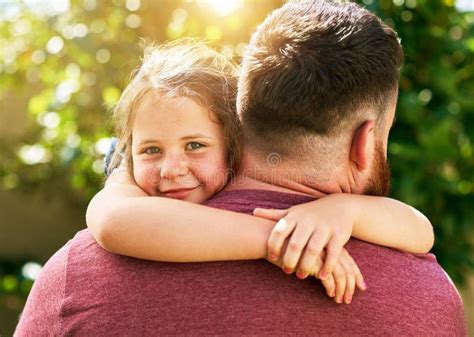 Whos Got the Best Dad in the World I Do. an Adorable Little Girl Giving Her Father a Hug ...