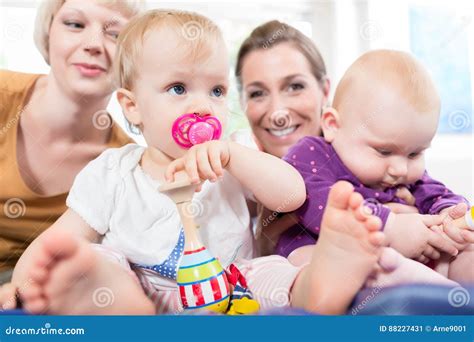 Babys in Toddler Group Playing Stock Image - Image of soother, playing: 88227431