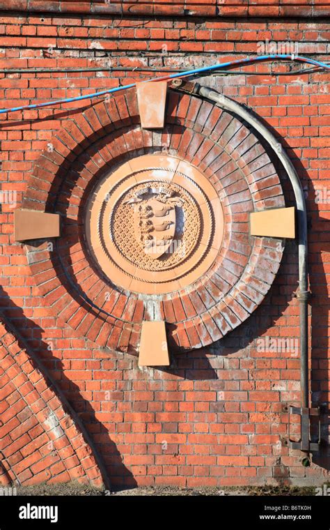 Coat of Arms inside decorative brickwork, Cinque ports, Ramsgate Stock Photo - Alamy