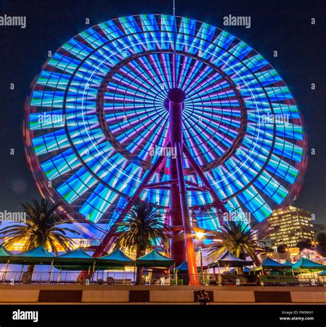 Night view of ferris wheel at Kobe Harborland, a shopping and entertainment area at Kobe Port ...