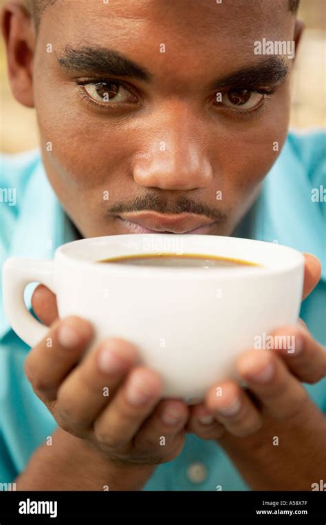 Man drinking coffee Stock Photo - Alamy