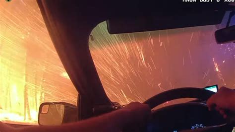 Bodycam footage shows dramatic wildfire escape | US News | Sky News