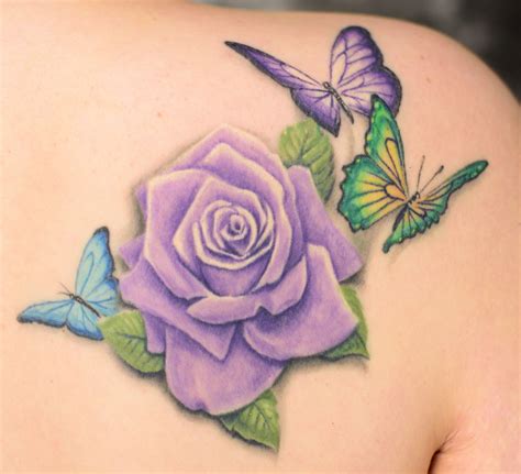 Purple rose tattoo with butterflies. For my daughter, her birth flower is a rose. Her signature ...