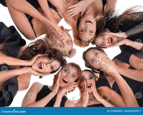 Group of Happy Amazed Women. Surprized and Looking Down Stock Photo ...