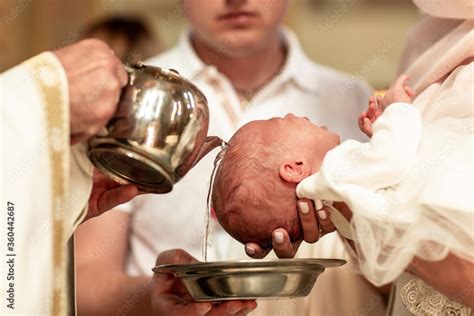 Baptism ceremony in Church. baptism holy water Catholic Stock Photo ...