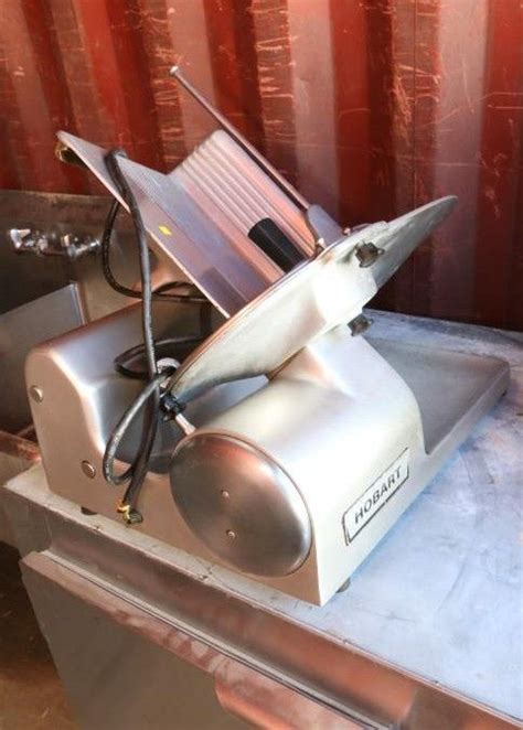 Hobart Stainless steel meat slicer model# 1612-G ser# 17 41 173, 1/3HP single phase approx 26" X ...