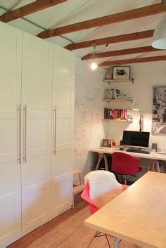 IKEA PAX wardrobe with doors, Bergsbo white in a converted garage ...