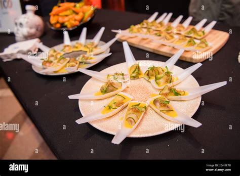 Japanese spoon appetizers with cucumber and garnish Stock Photo - Alamy