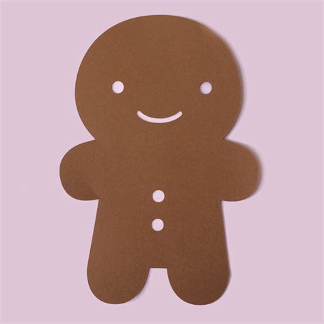 a brown paper cut out of a smiling ginger