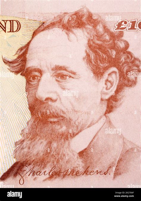 Charles Dickens a portrait from old English money Stock Photo - Alamy