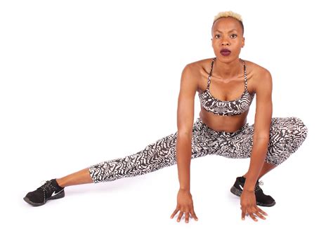 Athletic Woman Stretching on isolated white background