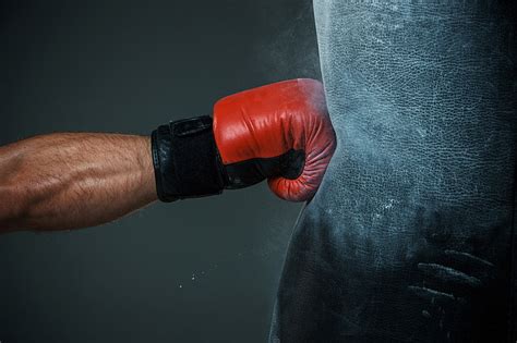 HD wallpaper: Boxing Glove hit, red and black boxing glove and punching bag | Wallpaper Flare