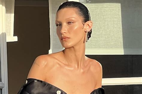 Bella Hadid Flaunts Toned Abs In Braless White Crop Top