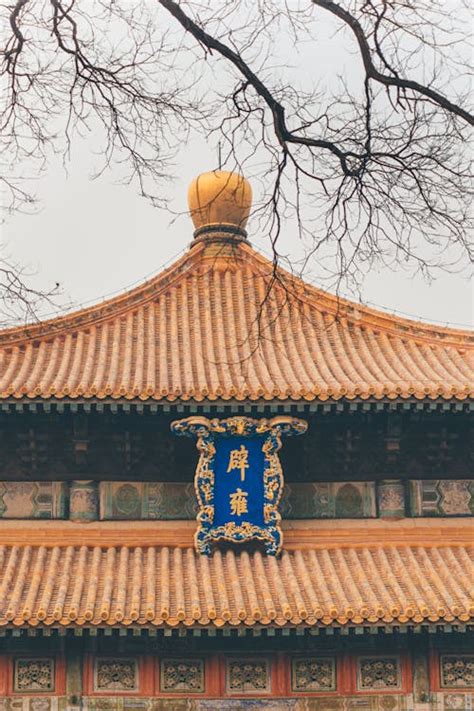 A Board on a Roof at the Lama Temple · Free Stock Photo