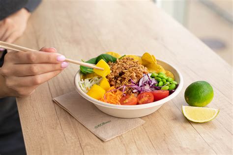 Person Eating Bowl of Salad · Free Stock Photo