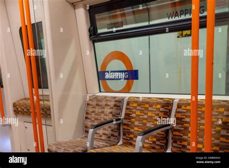 London England UK January 10th 2024 South London Overground Train Carriage with orange and check ...