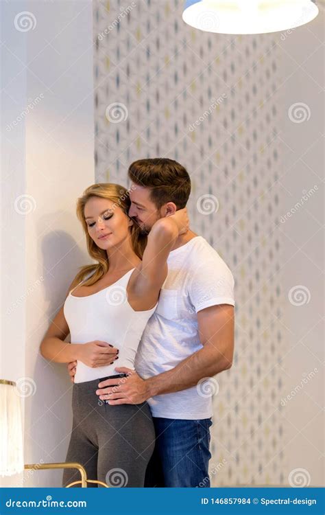 Young couple hugging stock photo. Image of relationship - 146857984