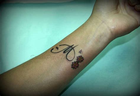 Letter M Tattoos Women