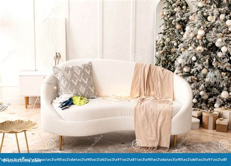 White Sofa in the Living Room. Christmas Tree. New Year Stock Photo ...