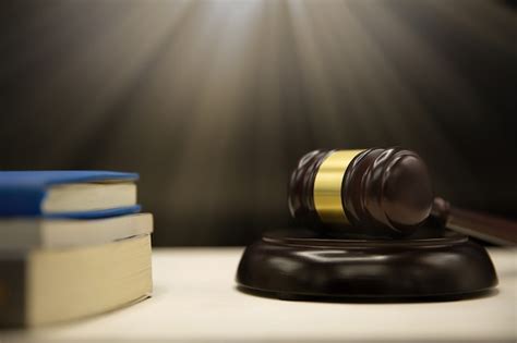 Judges gavel and book on wooden table. law and justice concept ...