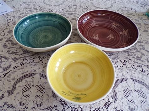 THREE NESTING POTTERY BOWLS, KELLOGG'S PETOSKEY for auction. Location: DINING ROOM | Pottery ...