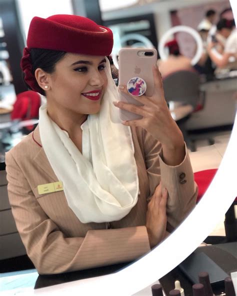 Pin by Aizat Mohd Sofian on Stewardess emirates cabin Crew female | Emirates cabin crew ...