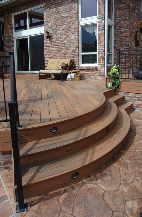 Patio with curved stairs. This is Fiberon composite decking. It's low ...