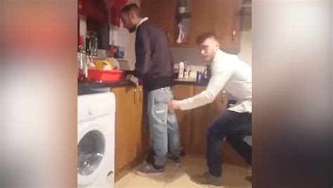 Man loses his balance after friend ripped his trousers off for a prank video | Daily Mail Online