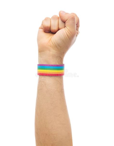 Hand with Gay Pride Rainbow Wristband Shows Fist Stock Image - Image of ...