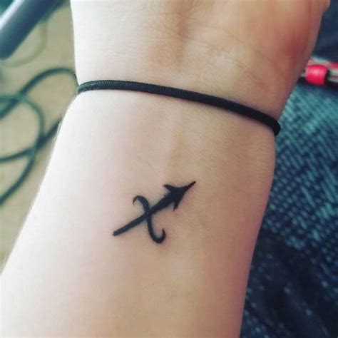 Mini Zodiac Sagittarius Symbol Wrist Tattoo | Sagittarius tattoo ...