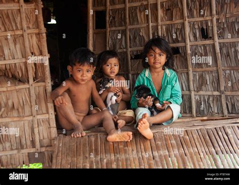 Cambodian children in the floating village on Tonle Sap lake, Siem Reap Province, Chong Kneas ...