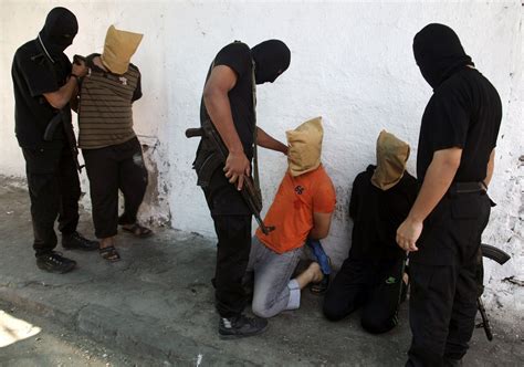 Hamas Publicly Executes 18 Palestinians Accused of Aiding Israel - Newsweek