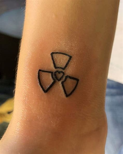 Radiation Caution Symbol with Heart Tattoo | Tech tattoo, Medical tattoo, Tattoos