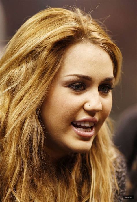 Miley at a New Orleans Saints Football Game on December 12,2010 - Miley ...