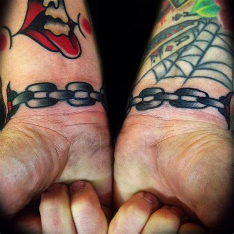 Broken handcuffs tattoo | TATTOO