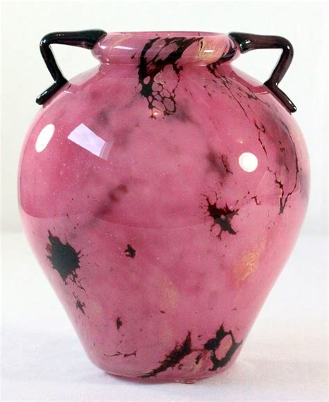 This striking vase by Schneider is in a Marbrines pattern. The vase has a very classical shape ...