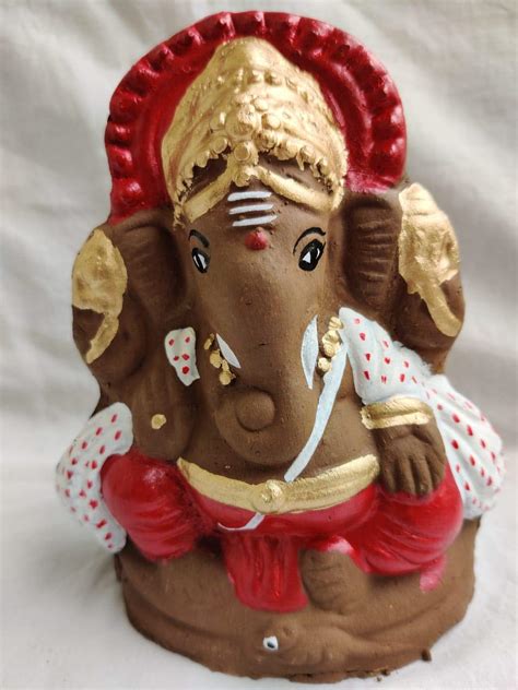 Buy Clay Ganesh Idol-RWG12305 Online at Low Prices in India - Amazon.in