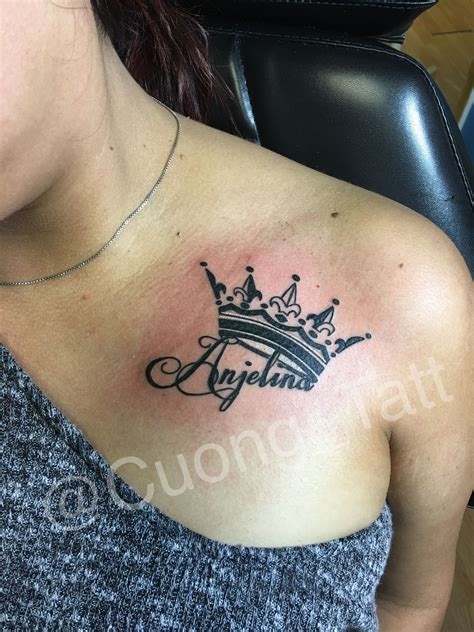 Fine line lettering with Crown Tattoo. | Tattoos for daughters, Shoulder tattoo, Shoulder name ...