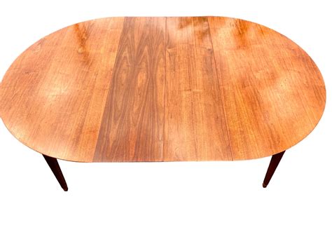 Mid-Century Modern Teak Dining Table, Two Leaves And Four Chairs For Sale at 1stDibs
